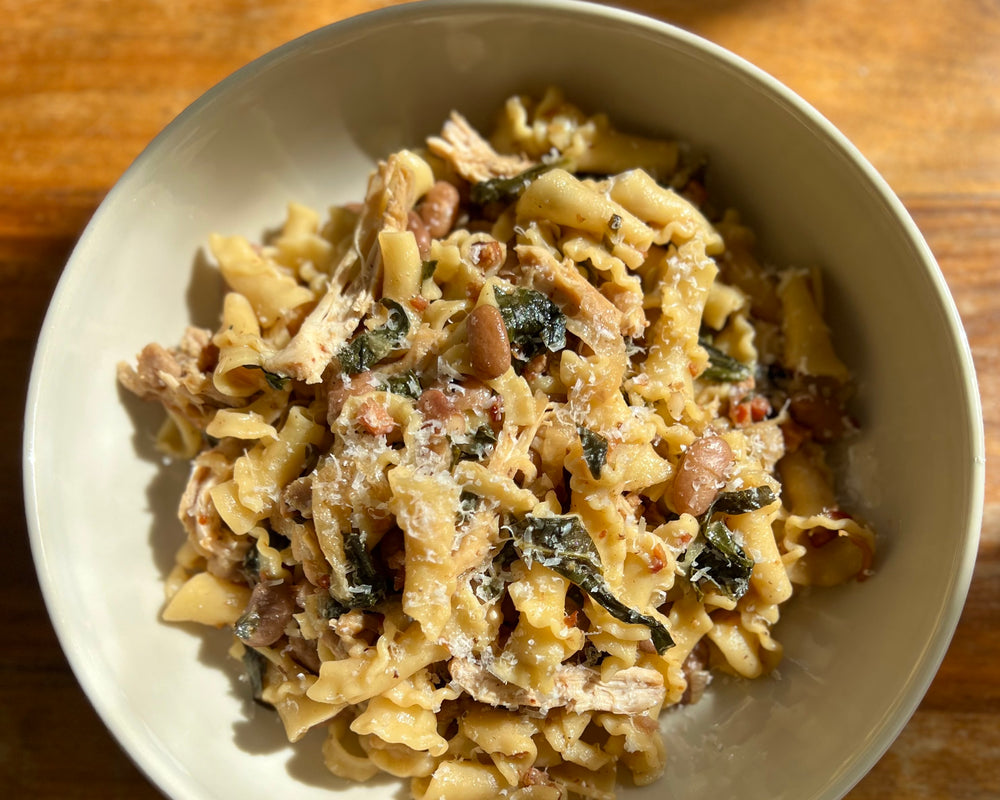 Campanelle with Beans, Bacon, Braised Chicken, Buttery Collards + Cheddar